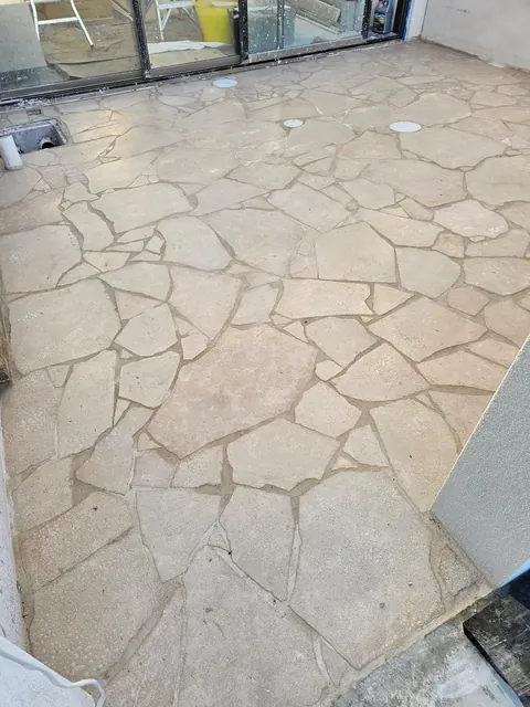 Crazy-paving stone floor at an alfresco doorway