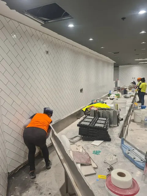 White subway wall tiles in a commercial kitchen
