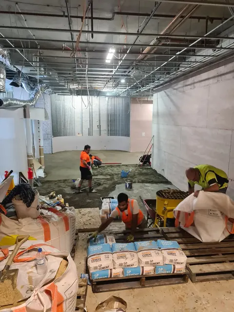 Floor preparation and screeding on a commercial site